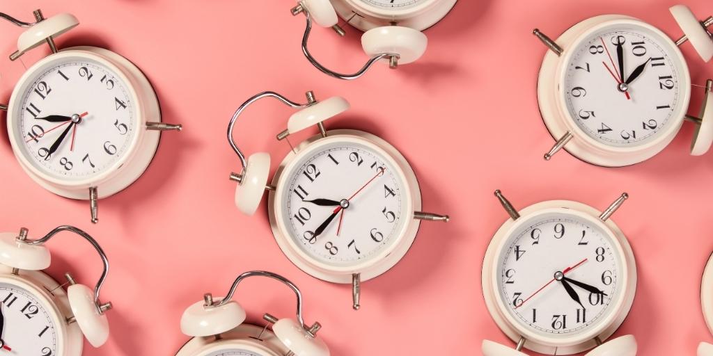 Alram clocks with pink background